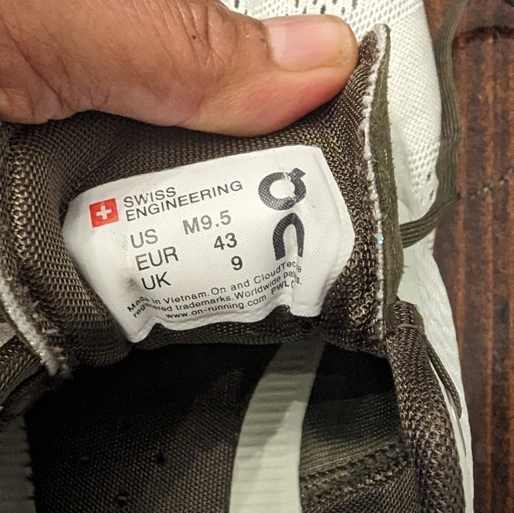 On cloud size 9.5 men light green and brown
